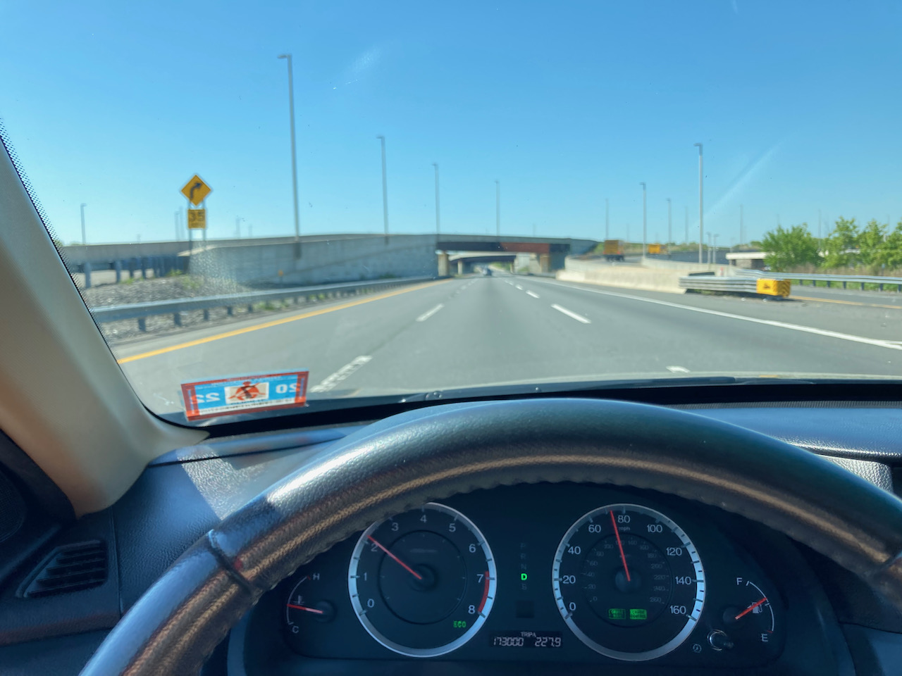 View of Garden State Parkway through car windshield.