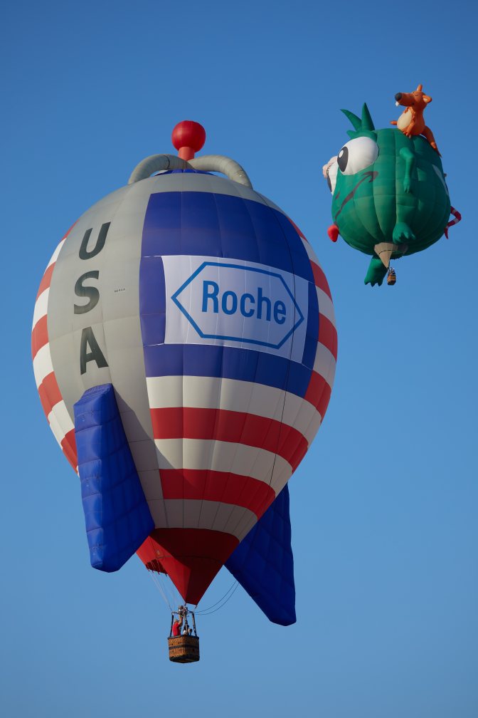 Grey rocket ship balloon with American flag, with