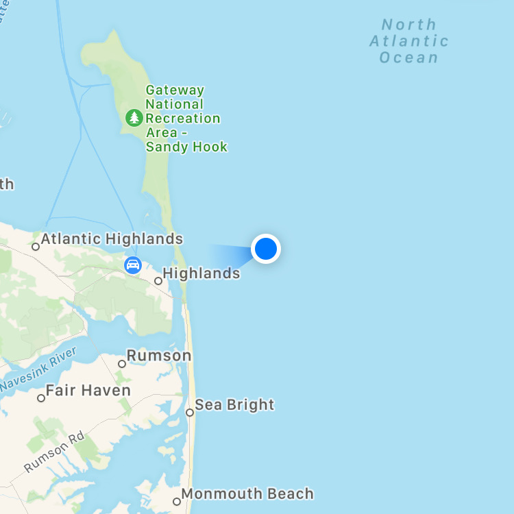 Map of Sandy Hook, with blue dot indicating boat location in Atlantic Ocean.