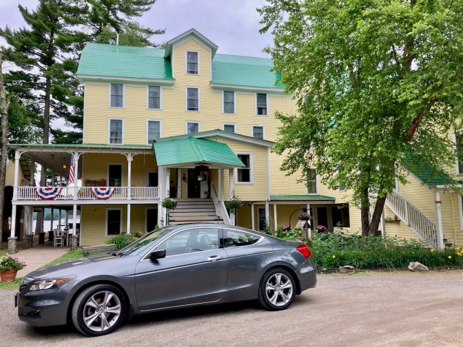 2012 Honda Accord parked in front of The Woods Inn.