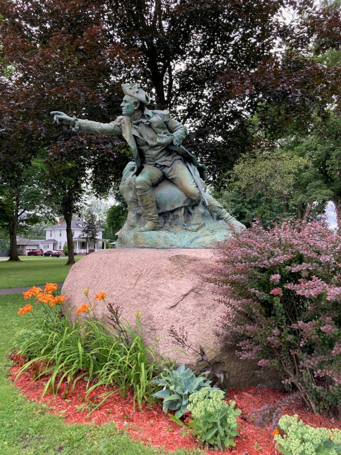 Statue of General Herkimer in park.
