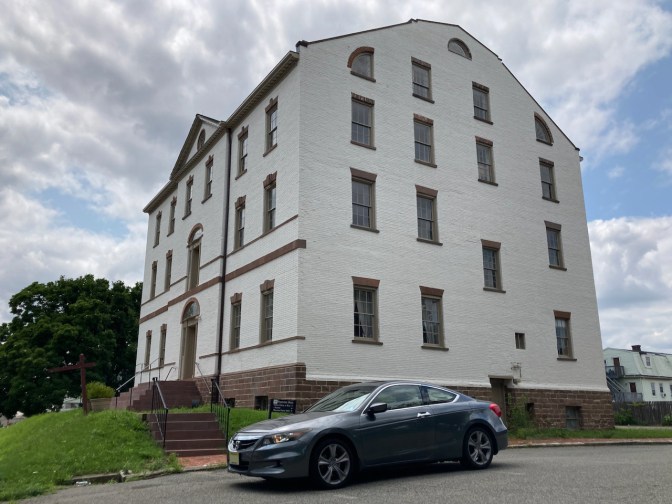 2012 Honda Accord parked in front of The Proprietary House.