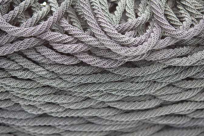 Rope embedded with glass beads.