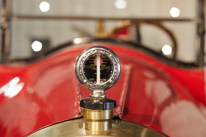 Hood ornament that is a radiator gauge on Scripps-Booth roadster.