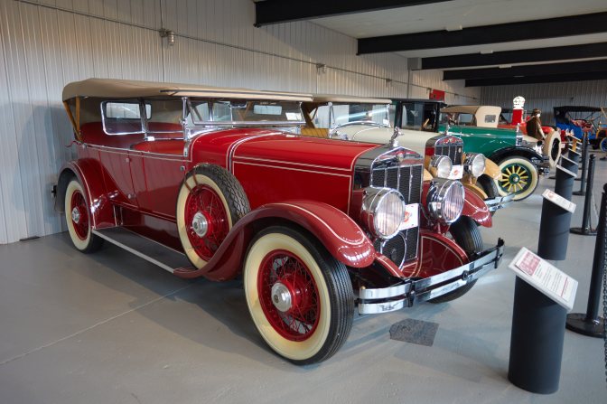 1932 Oldsmobile L32 four-door sedan, in red.