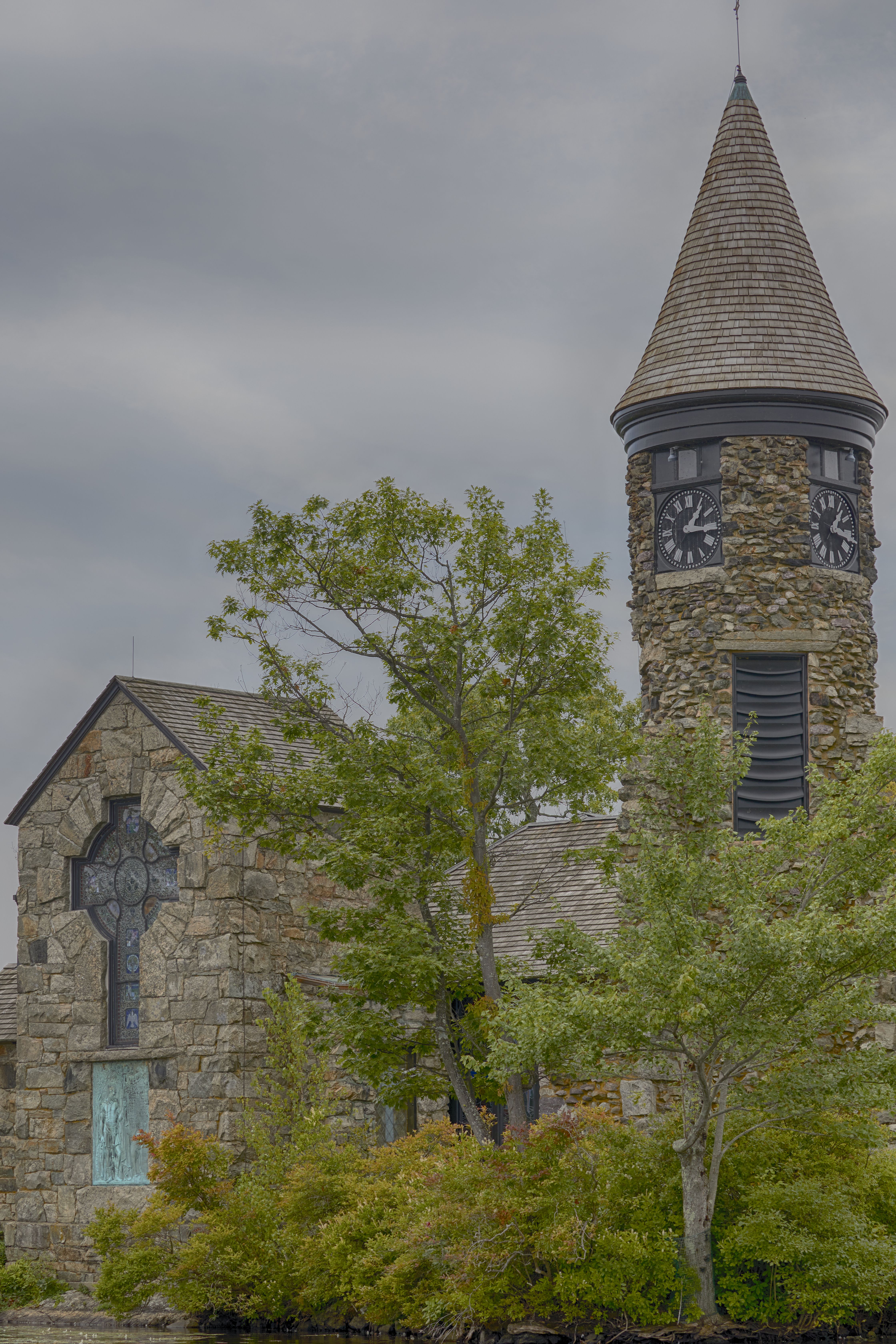 View of spire and clock tower, along with chapel.