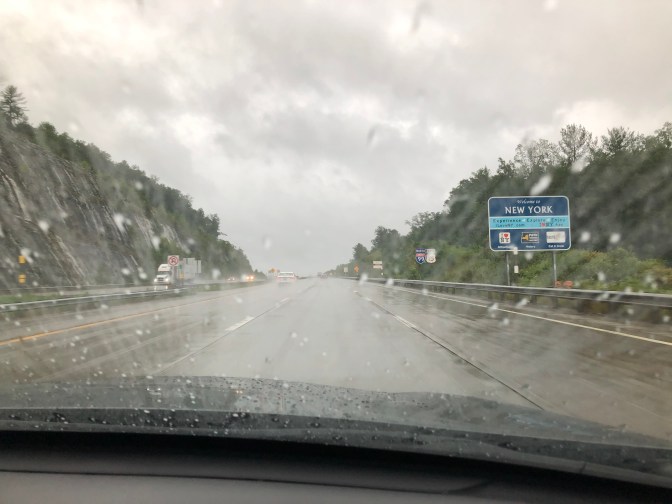 View of I-99 with sign on side of road that says WELCOME TO NEW YORK.