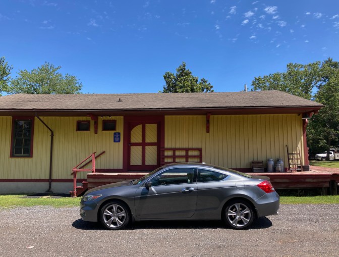 2012 Honda Accord parked in front of Long-A-Coming Depot.