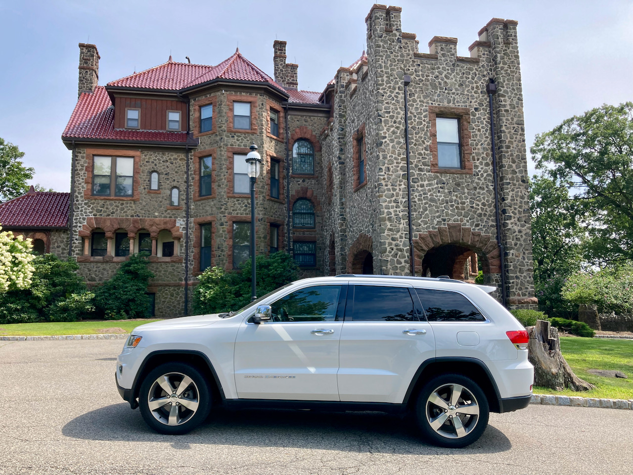 2014 Jeep Grand Cherokee parked in front of Kip's Castle.