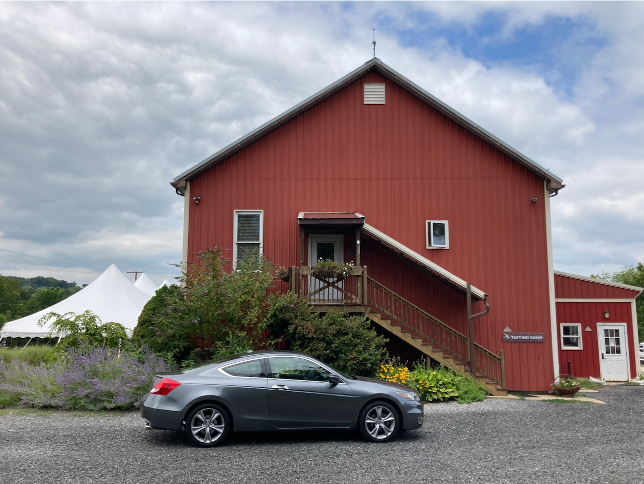 Exterior of Tasting Room in red barn of Unionville Vineyards.