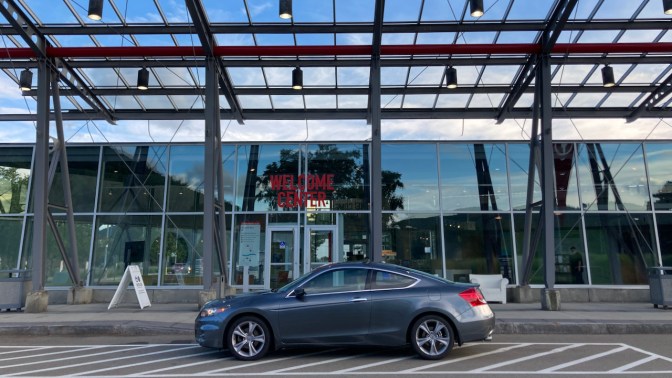 2012 Honda Accord parked in front of Welcome Center for Corning Museum of Glass.
