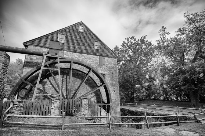 Black and white photo of grist mill.