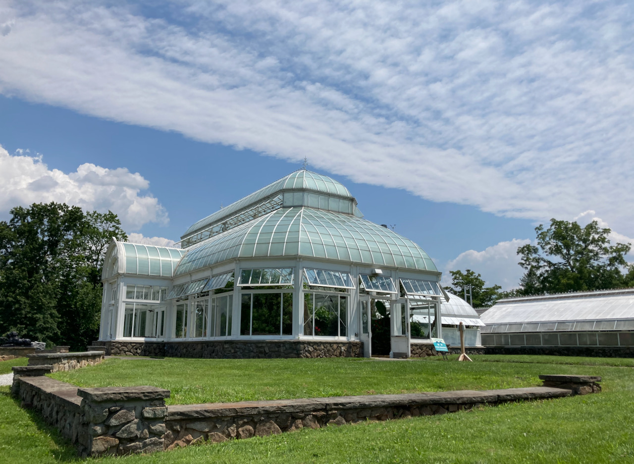 Exterior of The Orchid Range glass hothouse.