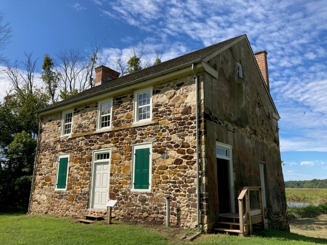 Elk Landing, two story stone house.