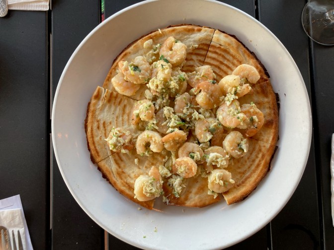 Flatbread with lump crab meat and shrimp.