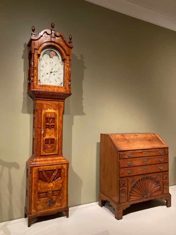 Grandfather clock and chest of drawers.