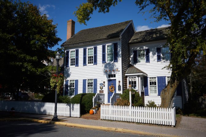 Two story white house. 