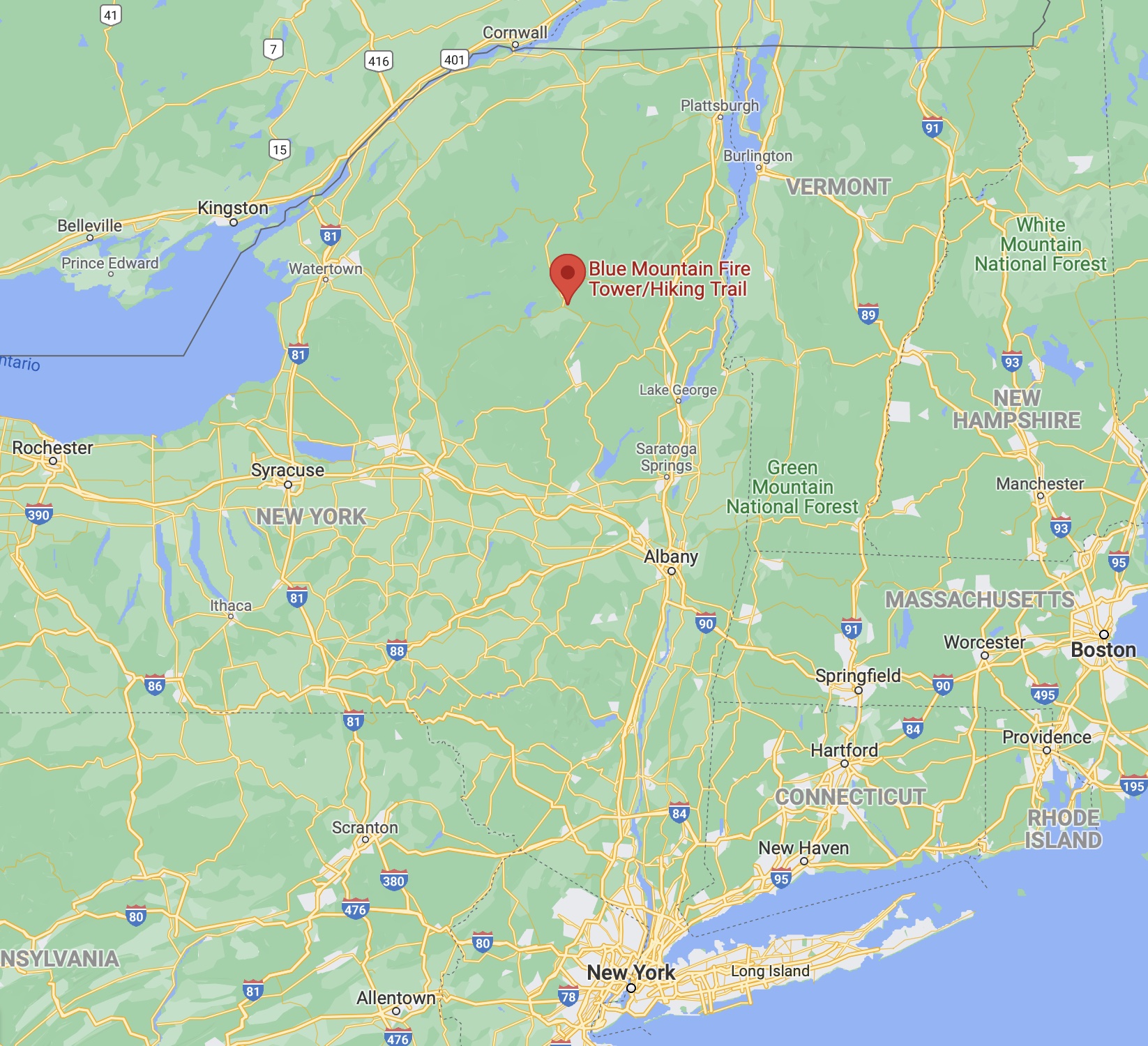 Map of New York and Adirondack State Park, with red pin in location of Blue Mountain Fire Tower/Hiking Trail.