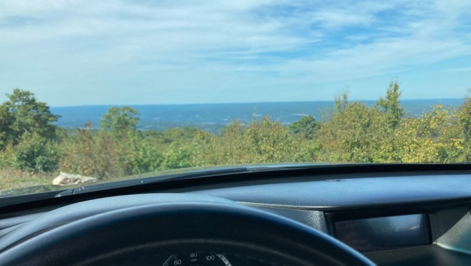 View of Pennsylvania and New Jersey from on top of mountain. View is through windshield of 2012 Honda Accord. 