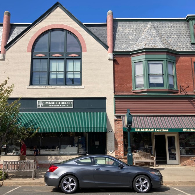 2012 Honda Accord parked in front of buildings in Clinton. 