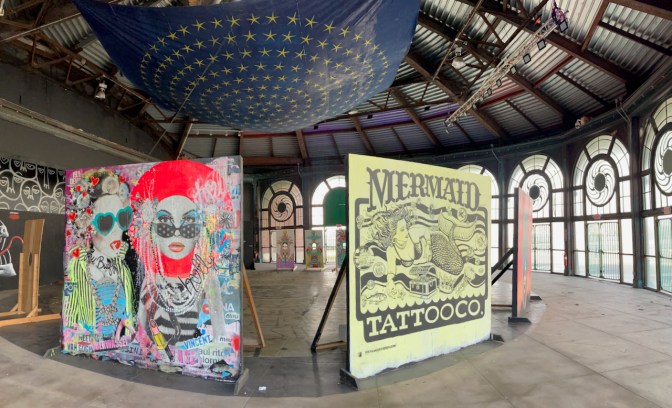 Panorama of carousel house, with art installations. 