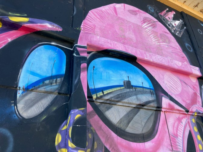 Mural of Octopus wearing sunglasses.