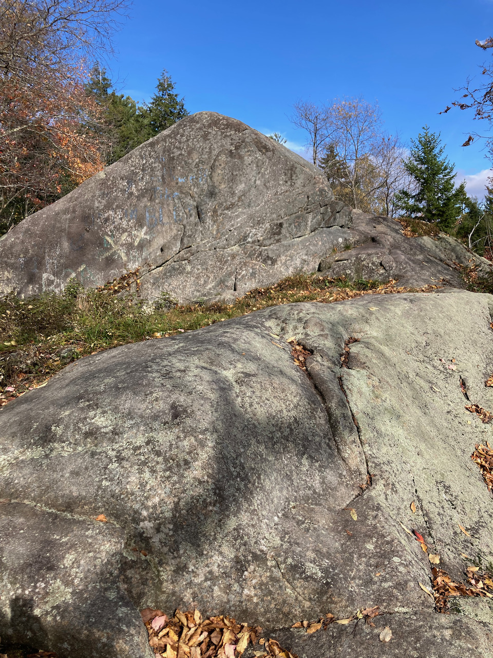 Bare rockface near top of hill.