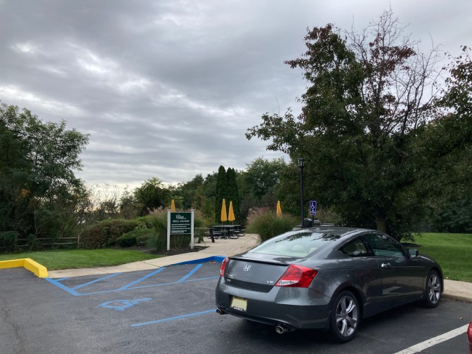 2012 Honda Accord coupe, parked beside picnic area in apartment complex. 