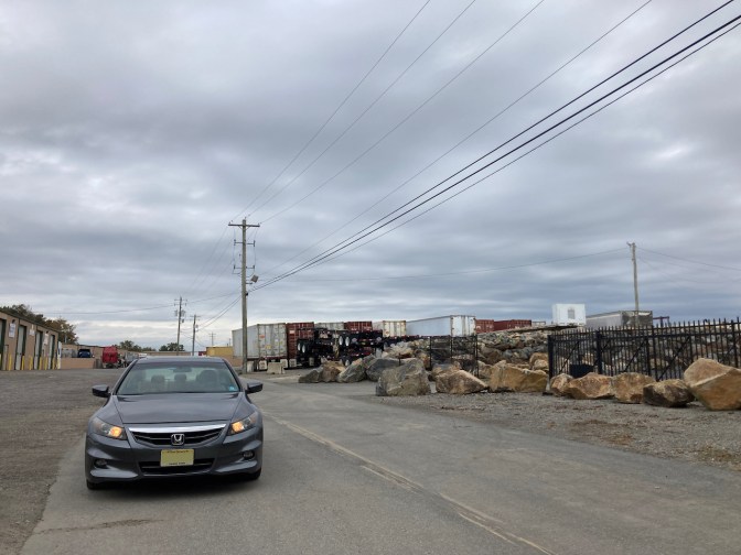 2012 Honda Accord in industrial parking lot. 