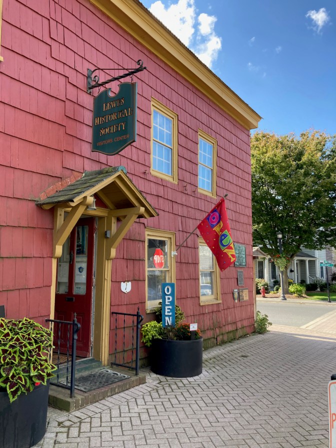 Exterior of Lewes Historical Society, a red clapboard two-story building.