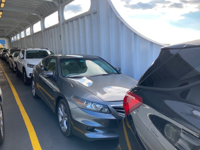 2012 Honda Accord parked on vehicle deck of ferry. 