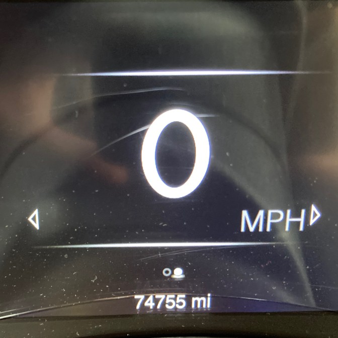 Car odometer reading 74755 miles. 