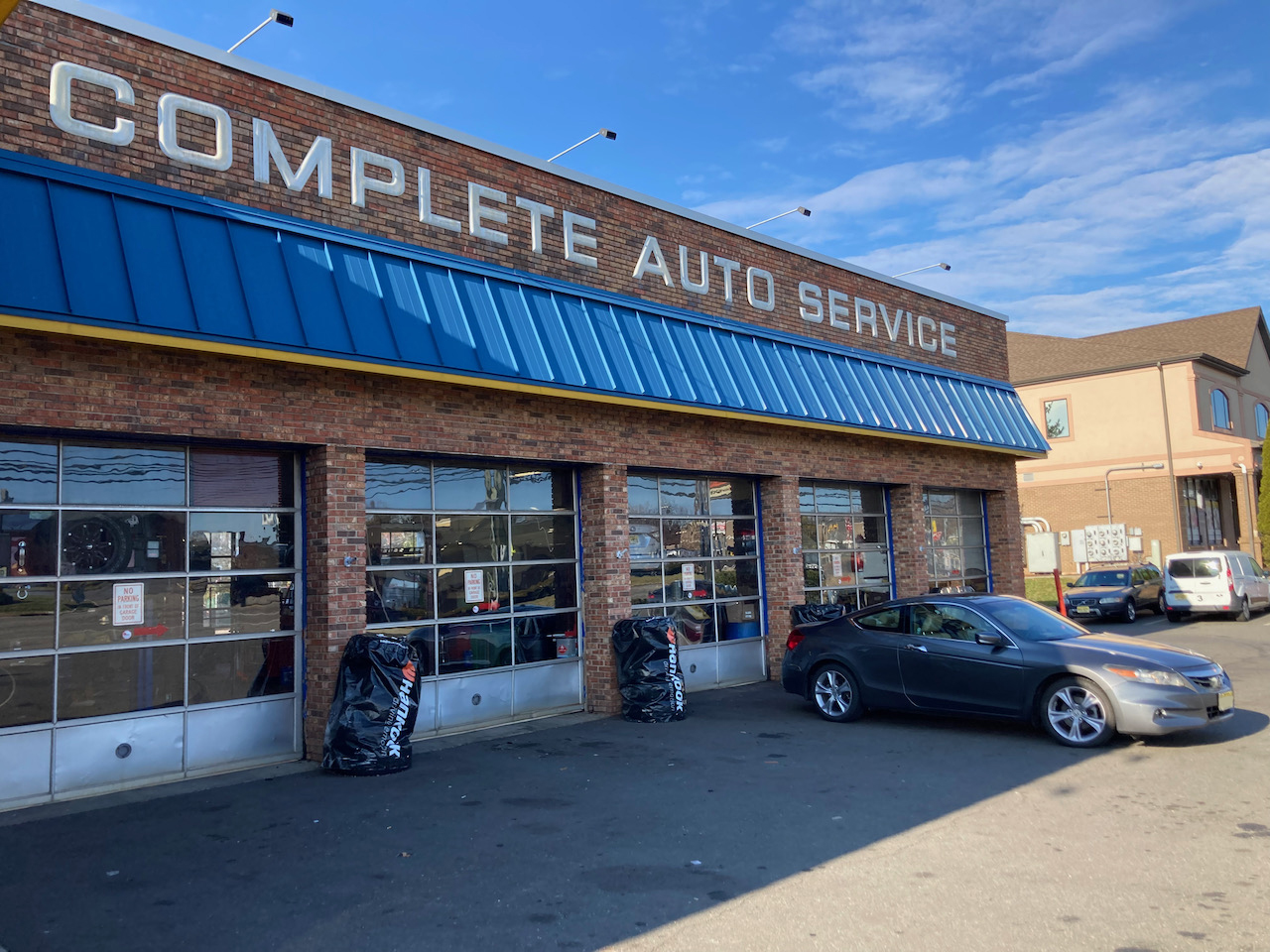 2012 Honda Accord parked in front of BC Tire.