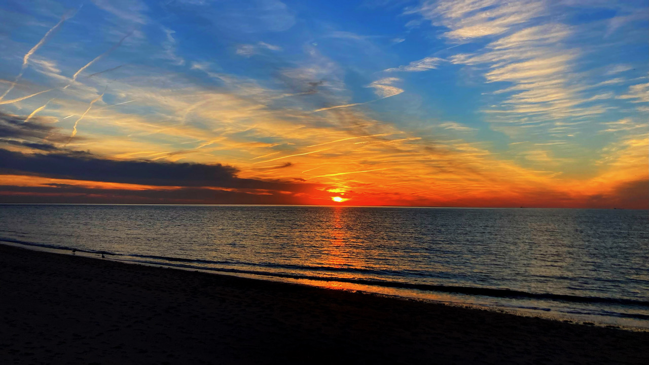 Sunset over ocean at Sunset Beach.