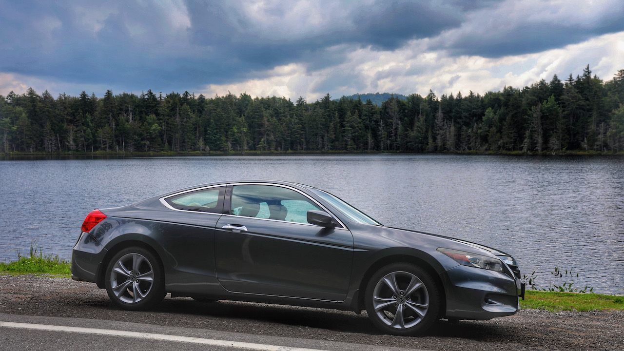 2012 Honda Accord coupe parked in front of Quiver Pond.