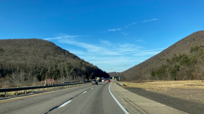 I-80 in Pennsylvania, with the road cutting between mountains.