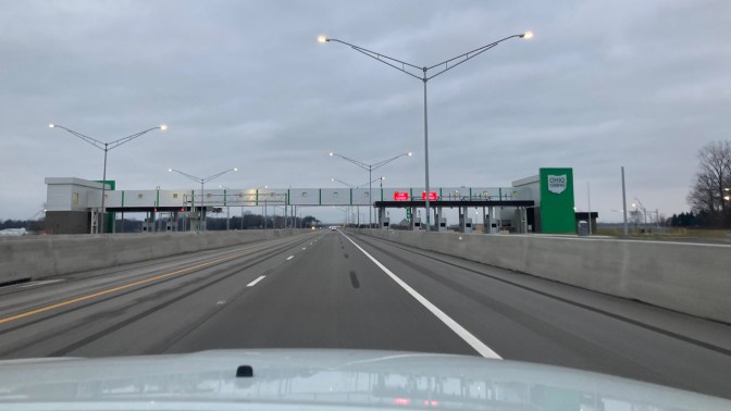 Ohio Turnpike tollbooth, crossing over I-80.