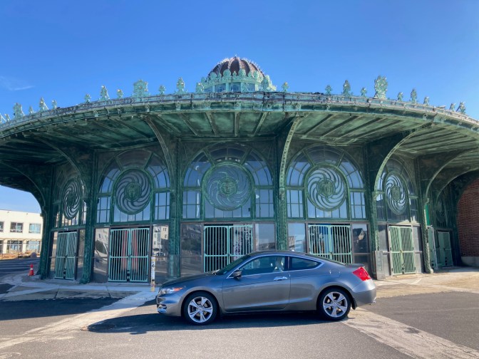 2012 Honda Accord parked in front of Beaux Arts-style round building.