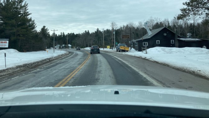 View of Route 28, with Wigwam Tavern on right side of road.