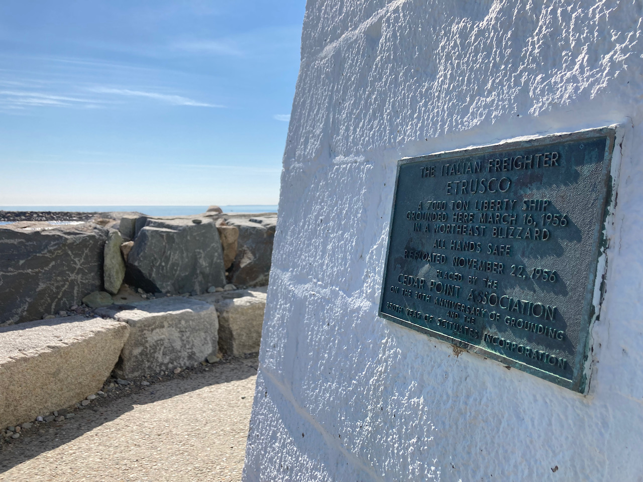 Plaque on lighthouse that marks the grounding of the Italian Freighter Etrucsco in 1956.