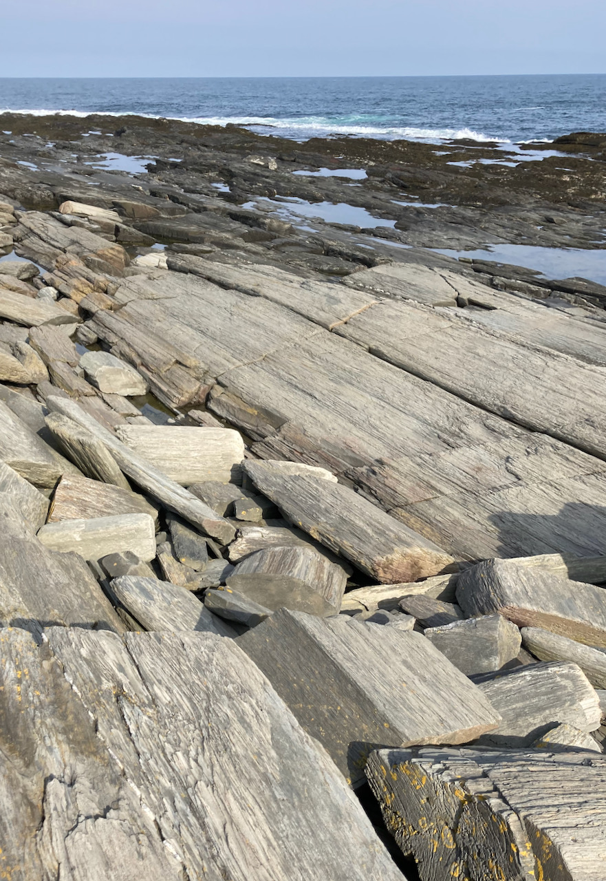 Exposed metamorphic rock ledge on coast of Two Lights State Park.