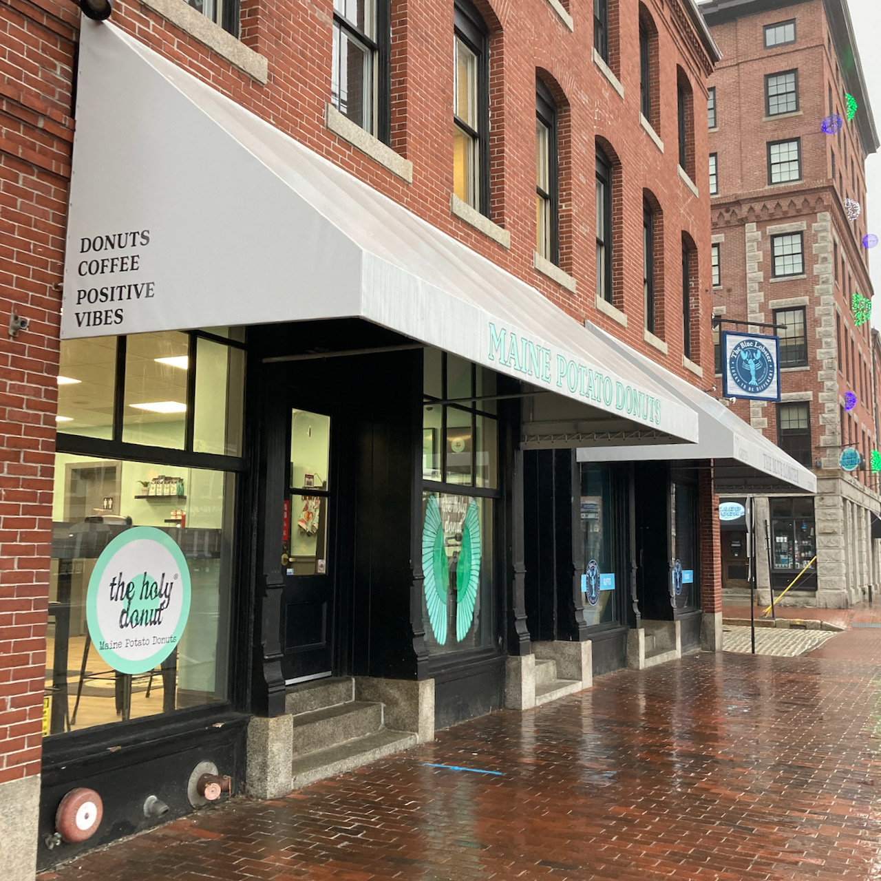 Exterior of The Holy Donut shop.