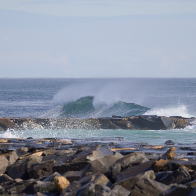 Waves crashing against shore.