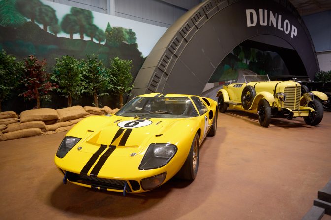 Display of American Le Mans winners, including a Ford GT 40 in foreground.