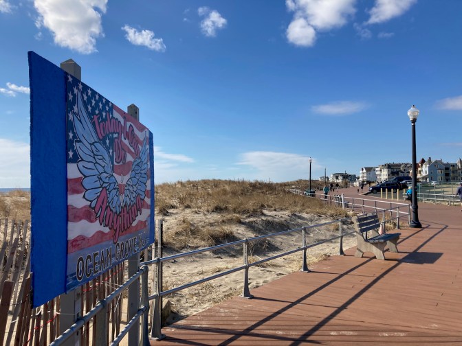 Boardwalk, with welcome sign for Ocean Grove on the left.