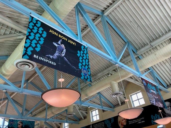 Ceiling banner with Jon Bon Jovi photo.