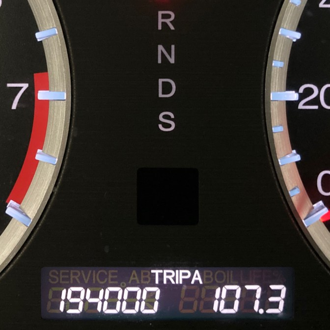 Car odometer reading 194000 TRIP A 107.3