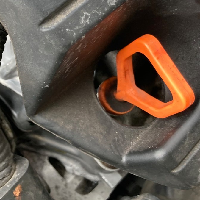 View of dip stick and engine.