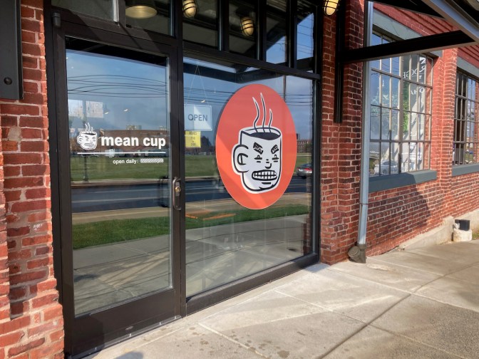 Exterior of Mean Cup coffee shop.