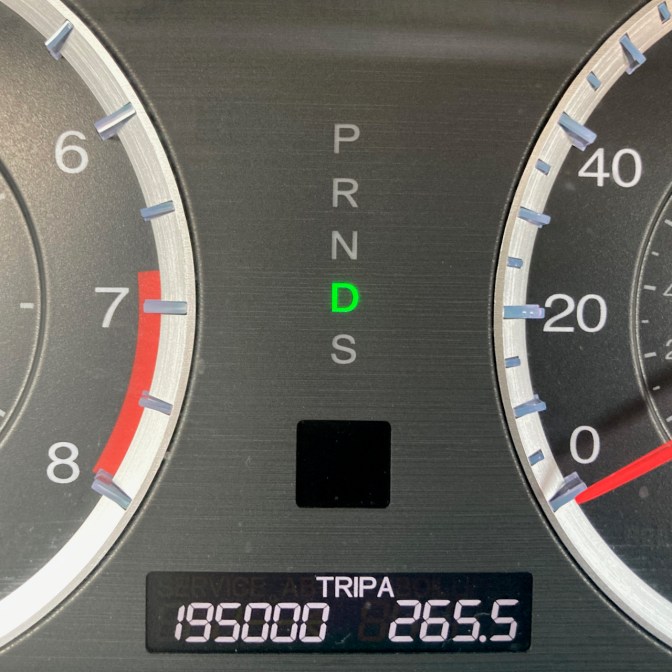 Car odometer reading 195000 TRIP A 265.5